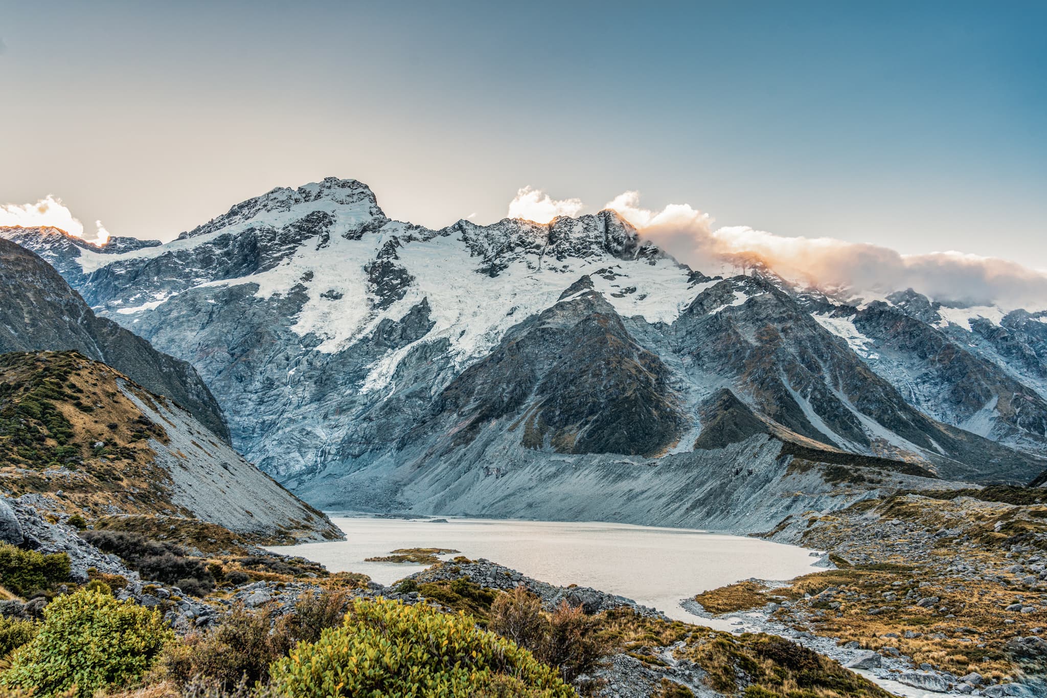 View of Mount Cook with mountain range and lake in Hooker Valley Track at New Zealand