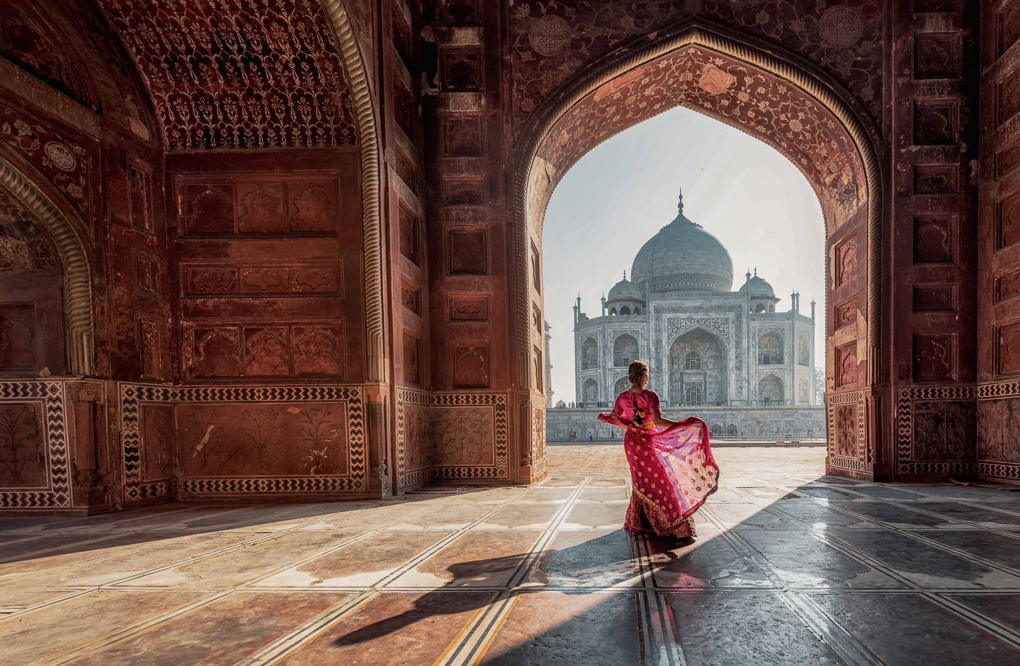 Woman wearing a saree at the Taj Mahal, Agra, India