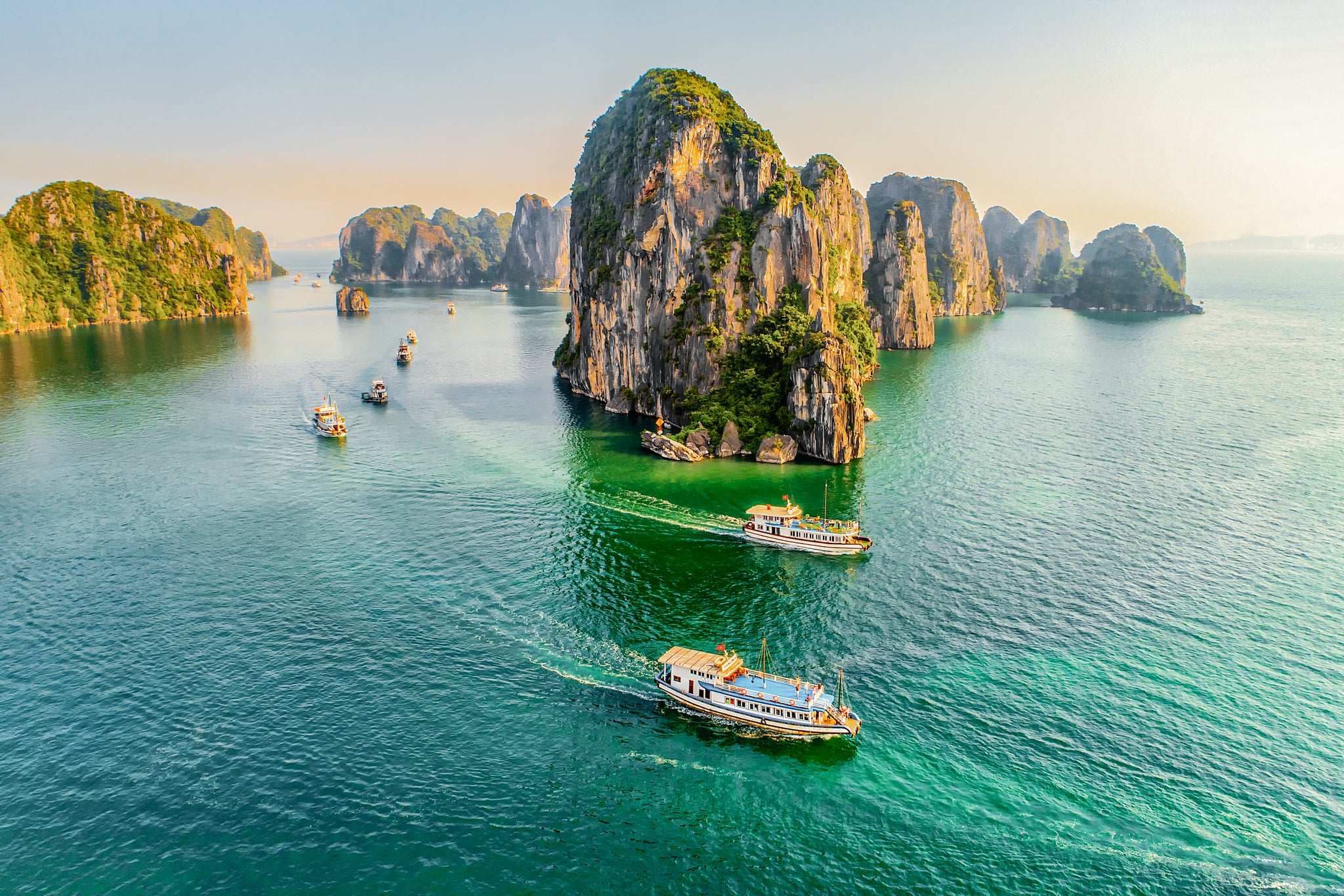 floating fishing village and rock island, Halong Bay, Vietnam, Southeast Asia. UNESCO World Heritage Site