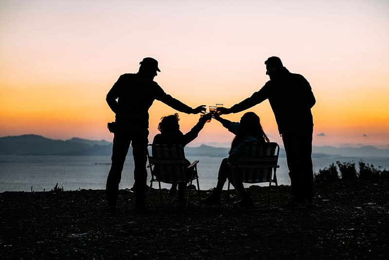 Four Friends Toasting at Sunset 1362914567 800x535