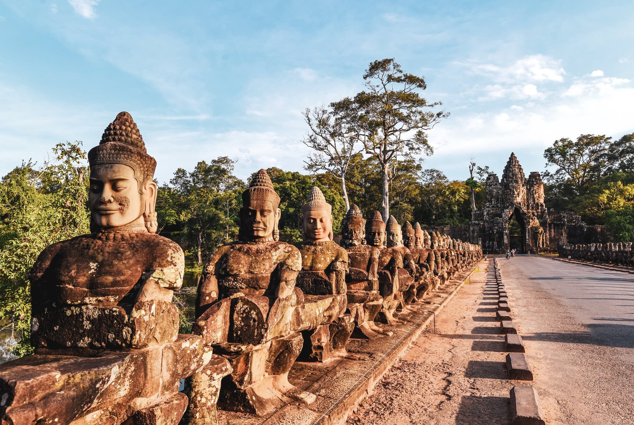 Angkor Wat temple complex reflected at sunrise on a luxury Cambodia tour