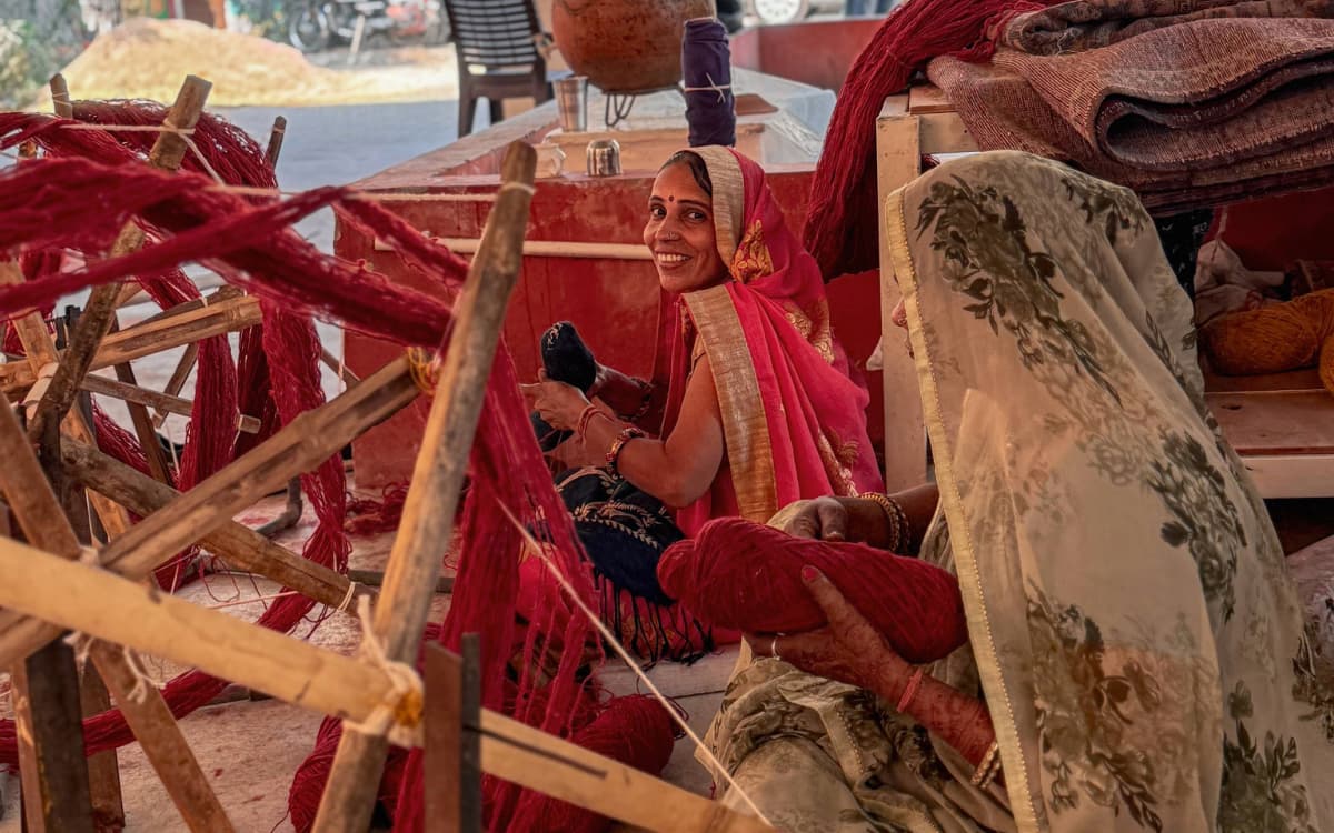 Woman weaving silk