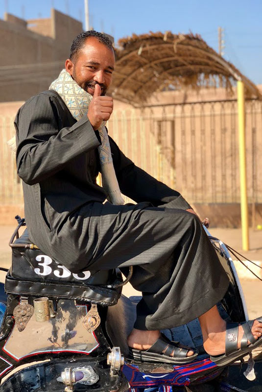 Egyptian carriage driver gives the thumbs-up