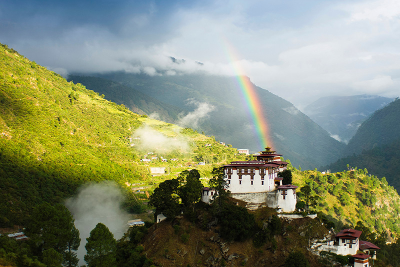 Lhuentse Dzong with rainbow overhead in eastern Bhutan
