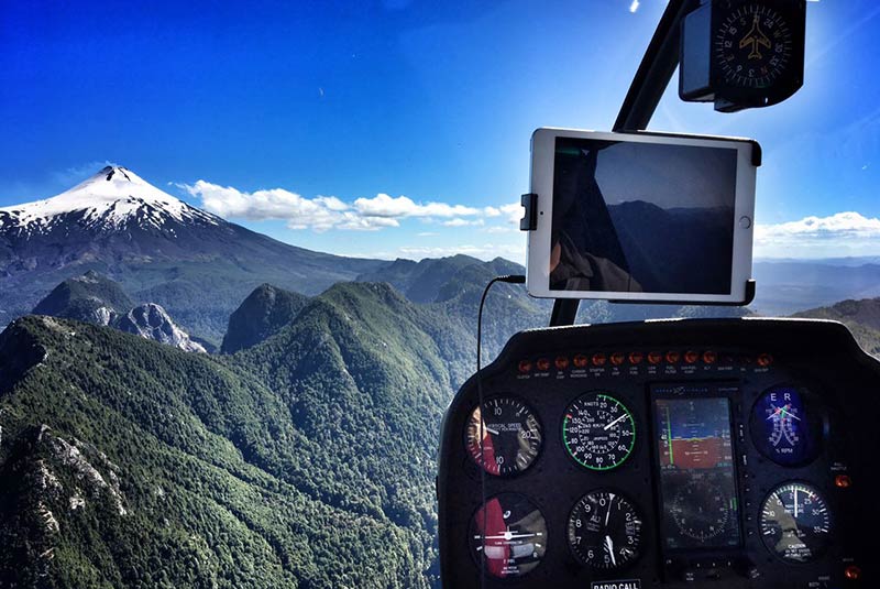 Scenic helicopter flight over the Villarica Volcano in Chile's Lake District