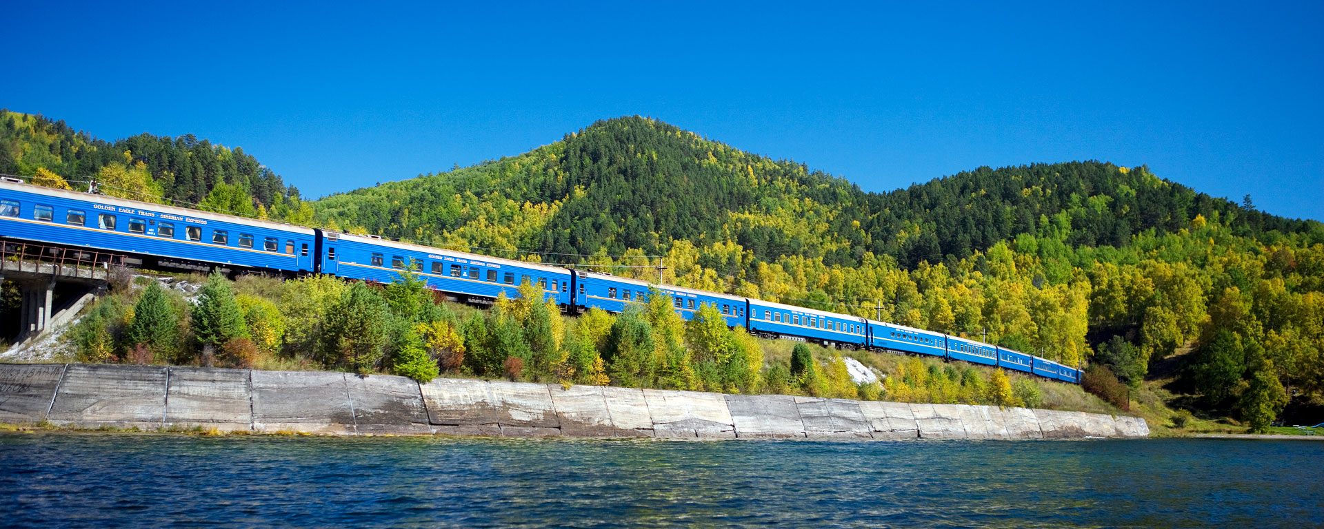 The Golden Eagle luxury train travels past Lake Baikal, Siberia, Russia