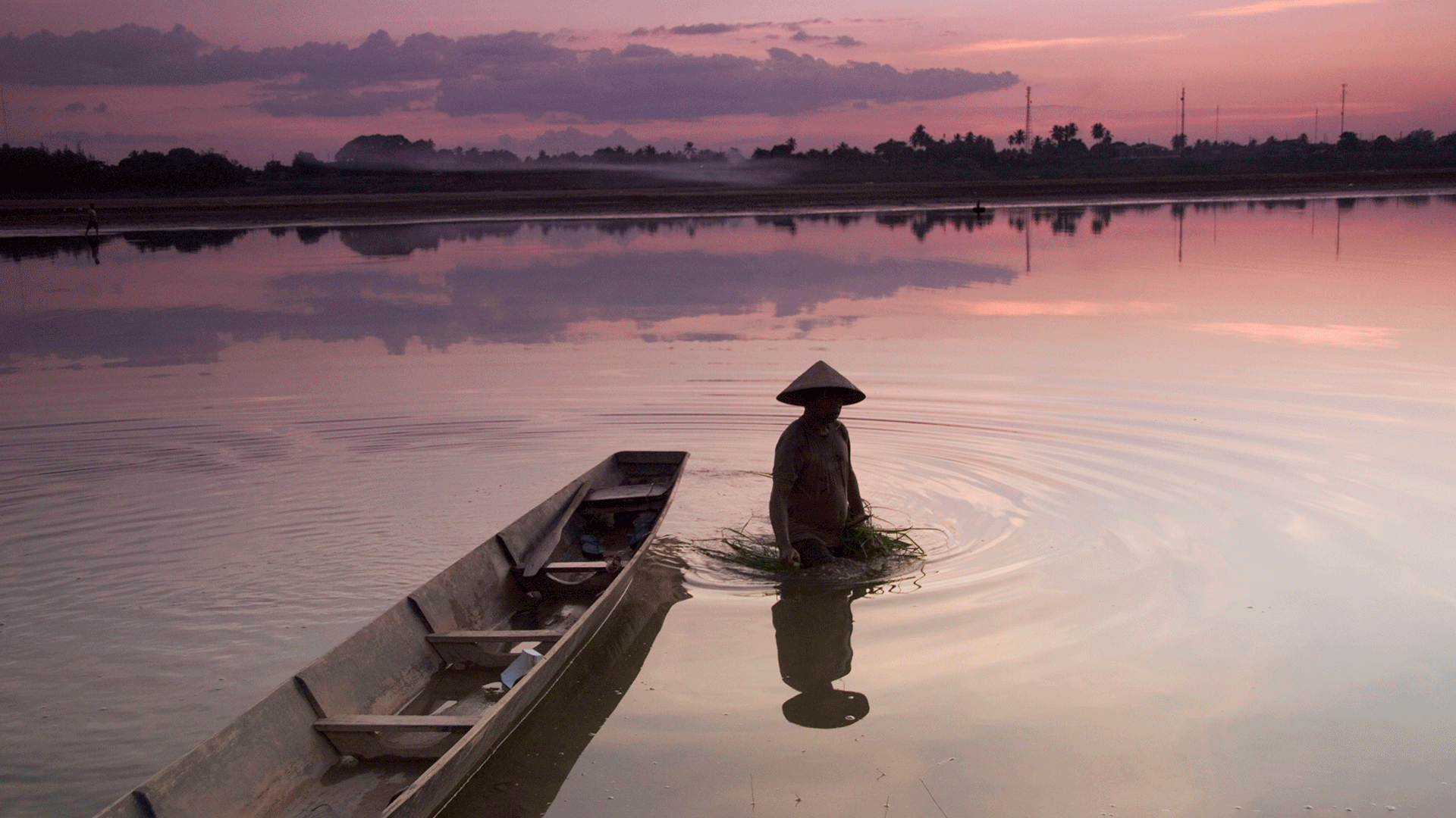 Vientiane fisherman at sunset